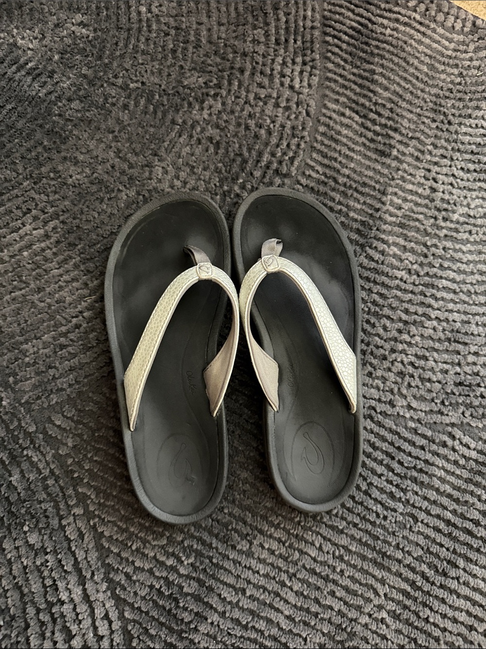 Olu Kai Black Flip-Flop Sandals with Metallic Silver Straps